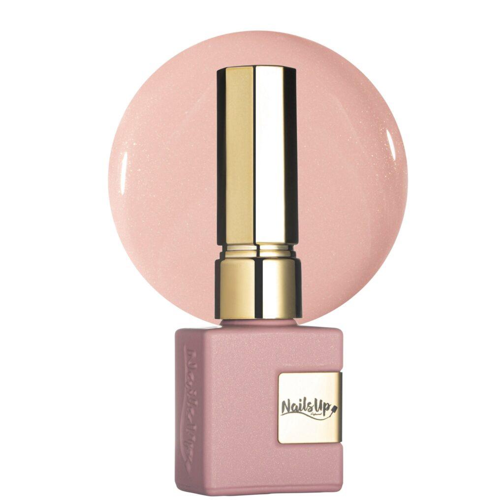 Esmalte semipermanente NailsUp rosa nude shimmer con destellos finos y acabado elegante.