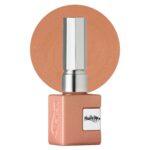 Esmalte semipermanente NailsUp color melocotón perlado con destellos brillantes y acabado elegante.