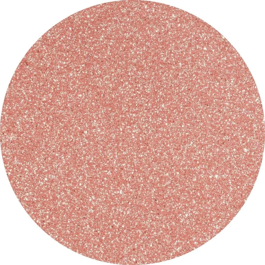 Un espectacular brillo champagne con reflejos rose gold que transforma cualquier manicura en una auténtica joya.