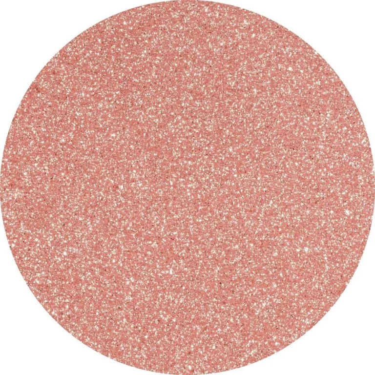 Un espectacular brillo champagne con reflejos rose gold que transforma cualquier manicura en una auténtica joya.