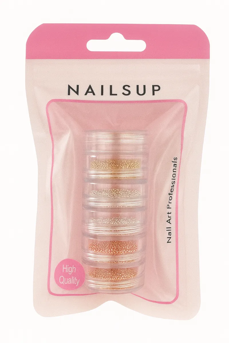Set de 6 tarros de microperlas para uñas NAILSUP – 3 colores metálicos recipientes apilables, presentado en un envase rosa con ventana transparente.
